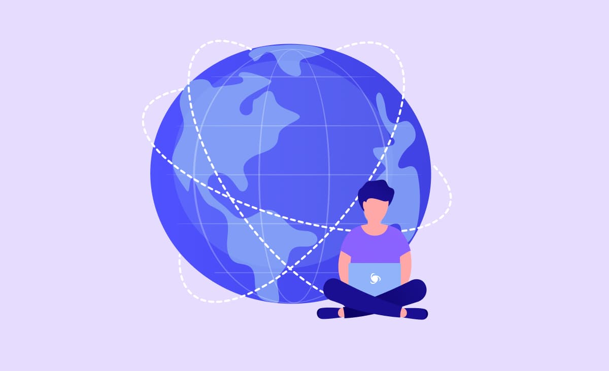 A man with a laptop is sitting in front of the globe searching for the web app development services. the globe is traversed by multiple dash lines representing different destinations for outsourcing.