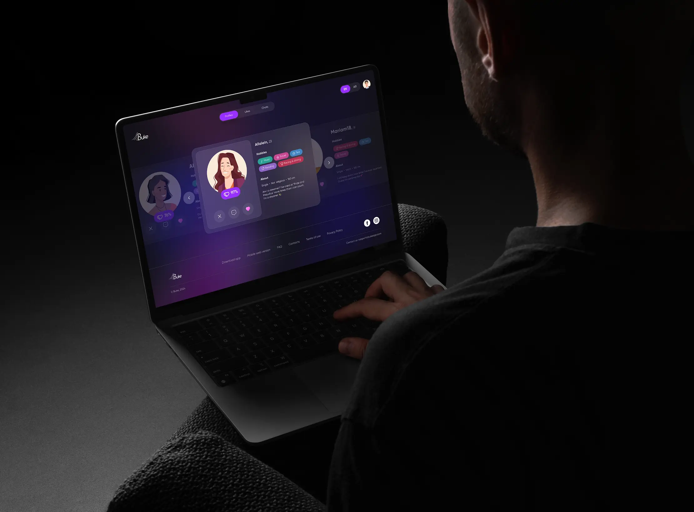 Person browsing Buke profiles on the web version on a laptop, dark theme.