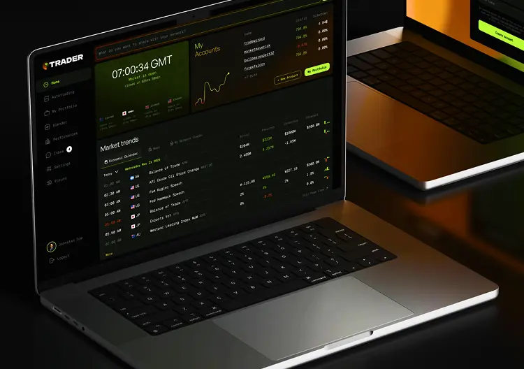 Laptop displaying the dark trading dashboard of the Forex social trading platform.