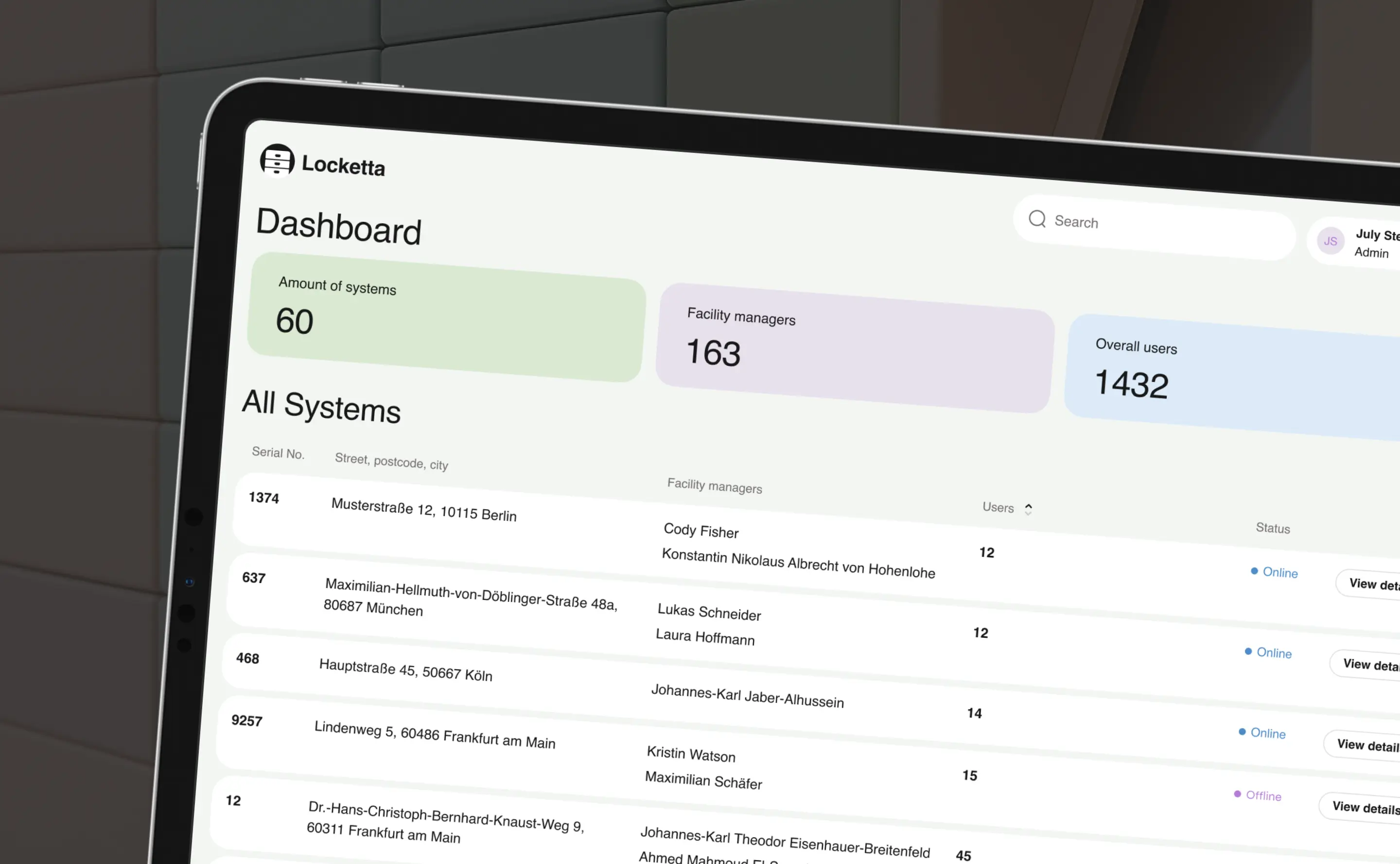 Tablet showing the locker admin dashboard with system stats and an overview table.