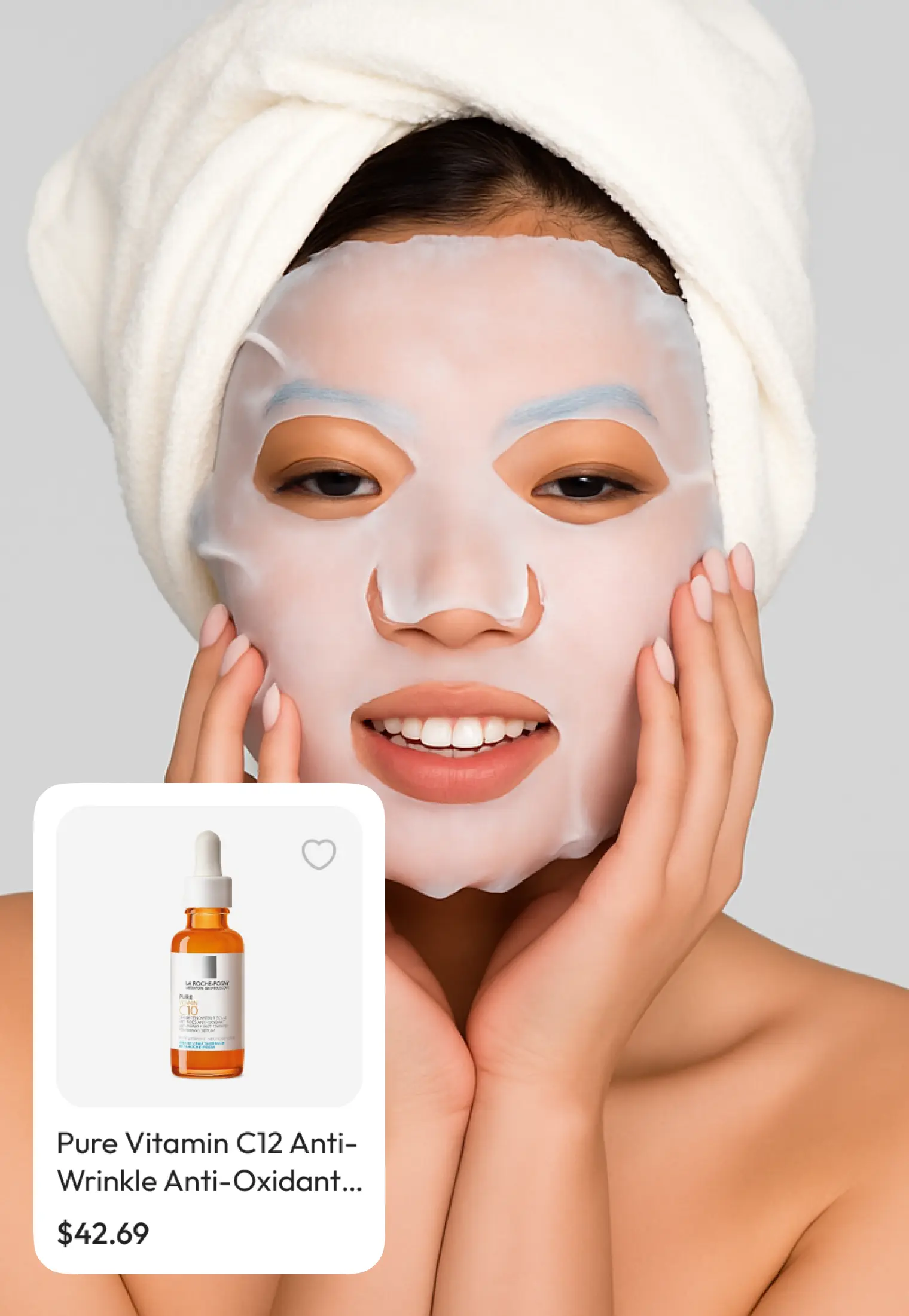 Woman in a sheet face mask with her hands to her cheeks next to a floating serum card from the catalog.