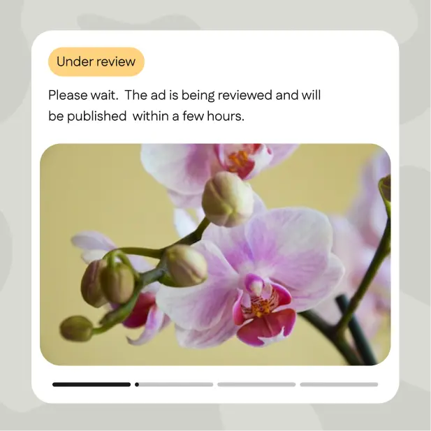 In-app notice showing a plant ad under review with an orchid photo before publishing.